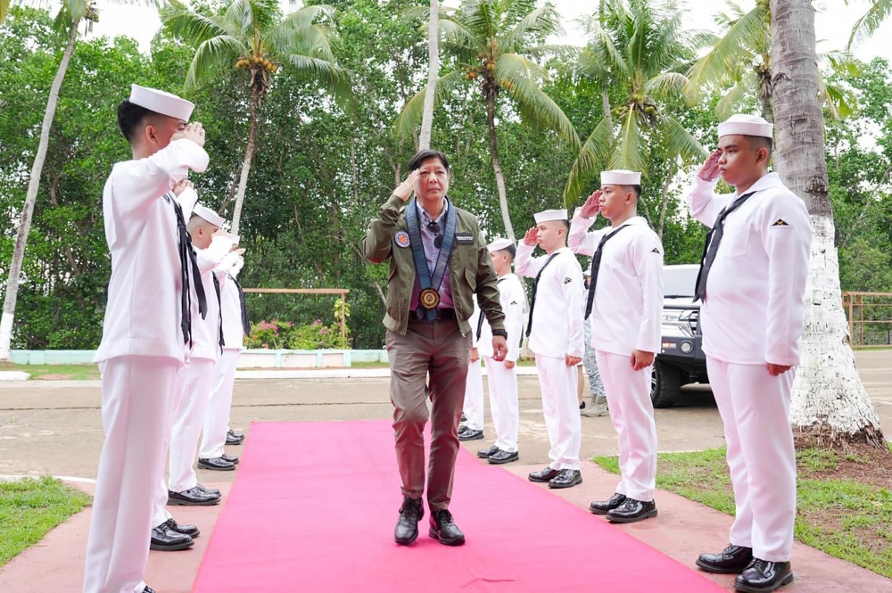 This handout photo taken and released on June 23, 2024 by the Presidential Communications Office shows Philippine President Ferdinand Marcos arriving at the Philippines’ South China Sea Forces Headquarters in Puerto Princesa, Palawan. (Photo by Handout / Presidential Communications Office (PCO) / AFP) 