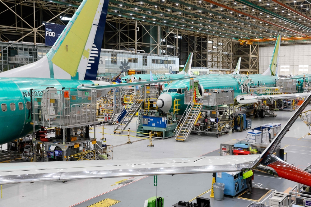Boeing 737 MAX aircraft are assembled at the Boeing Renton Factory in Renton, Washington, on June 25, 2024. (Photo by Jennifer Buchanan / POOL / AFP)