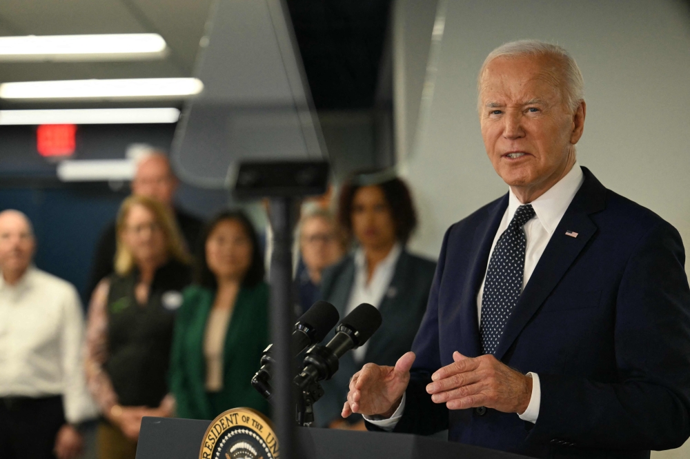 US President Joe Biden speaks about extreme weather at the DC Emergency Operations Center in Washington, DC, July 2, 2024. (Photo by Jim Watson / AFP)

