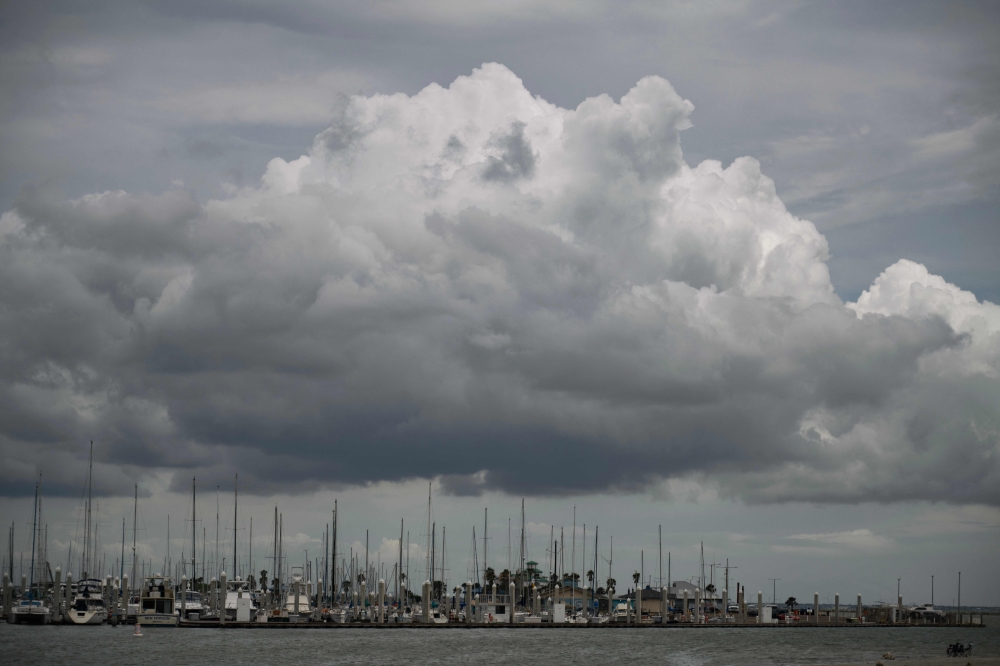 Boats sit in a marina ahead of the arrival of Tropical Storm Beryl in Corpus Christi, Texas on July 7, 2024. (Photo by Mark Felix / AFP)