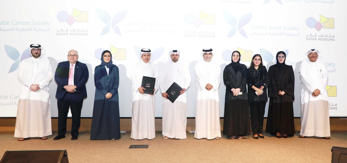 Chairman of  Qatar Cancer Society Sheikh Dr. Khalid bin Jabor Al Thani (fourth left) and CEO of Qatar Museums Mohammed Saad Al Rumaihi (fifth left) with other officials during the MoU signing ceremony. 