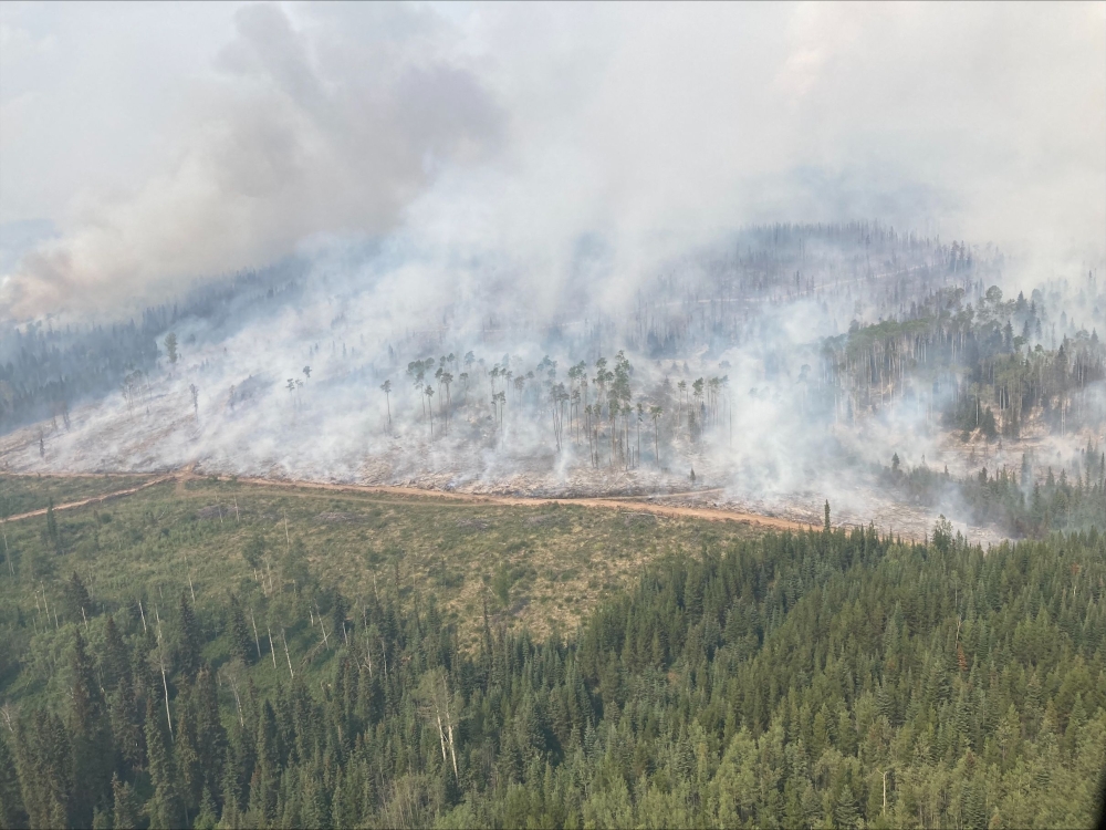 FILE PHOTO: This handout photo provided by the British Columbia Wildfire Service on July 12, 2023, shows the Tintagel wildfire in Tintagel, British Columbia, Canada. (Photo by Handout / BC Wildfire Service / AFP)