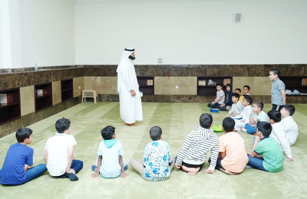 Children attend a session as part of Awqaf Ministry's summer programme. 