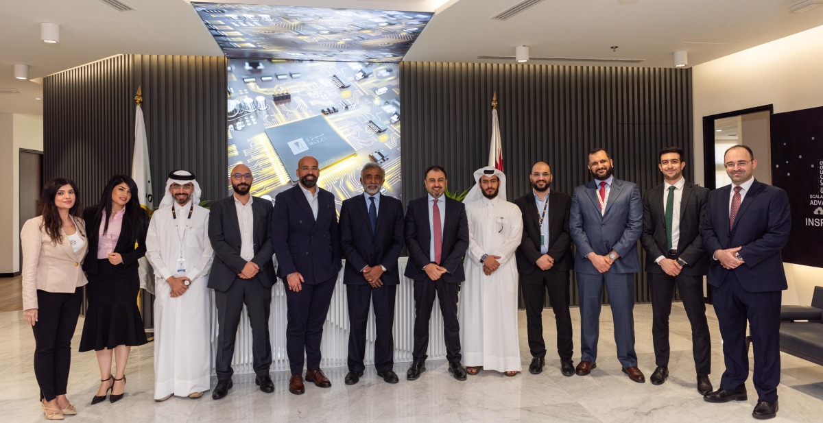 MEEZA and AMD officials during the agreement signing event.