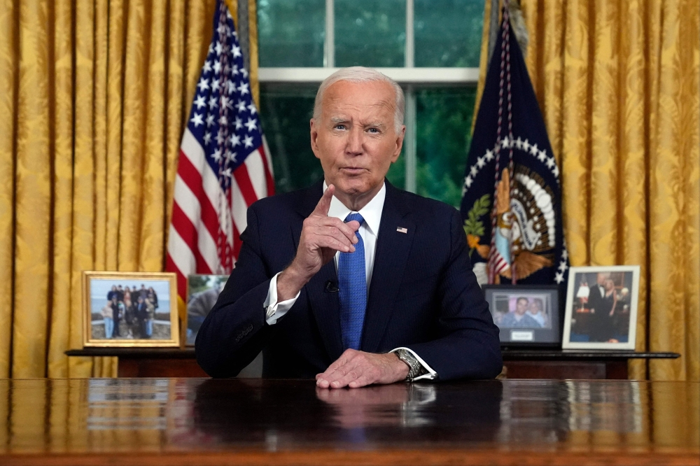 US President Joe Biden speaks during an address to the nation about his decision to not seek reelection, in the Oval Office on July 24, 2024. (Photo by Evan Vucci / POOL / AFP)
