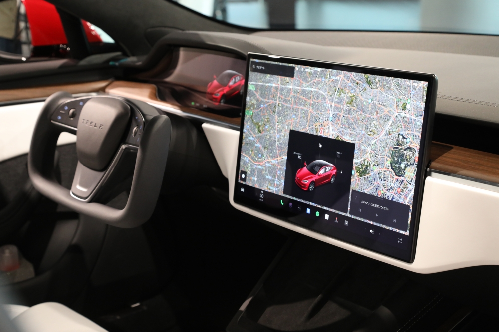 File: A touch screen inside a Tesla Inc. Model S electric vehicle displayed at a Tesla Motors Japan store in Tokyo, Japan, on August 18, 2023. (Photo by Shoko Takayasu/Bloomberg)

