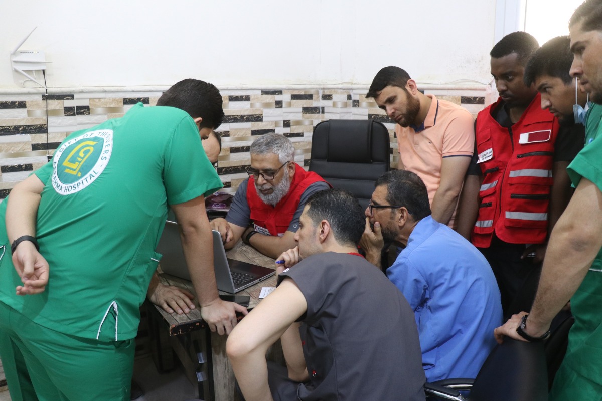 QRCS delegation with local doctors during a capacity building session.