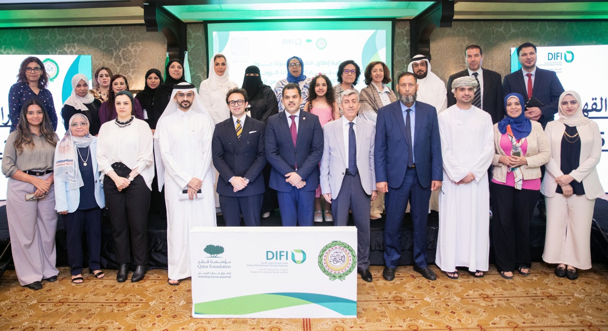 Doha International Family Institute officials and others during the ceremony.