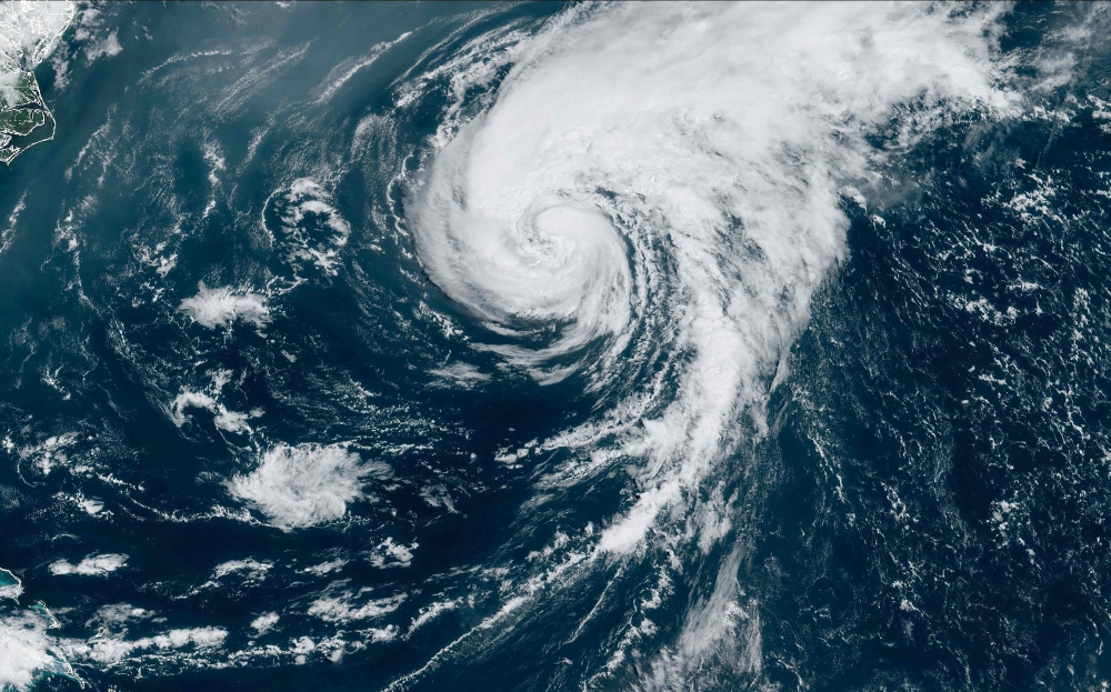 This satellite image obtained from the National Oceanic and Atmospheric Administration shows Hurricane Ernesto at 14:50 Zulu on August 17, 2024. Photo by Handout / NOAA/GOES / AFP