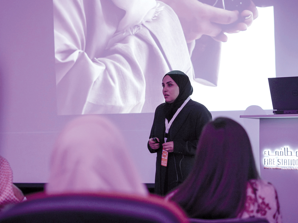 Guest speaker Mashael al Hejazi addressing the event.