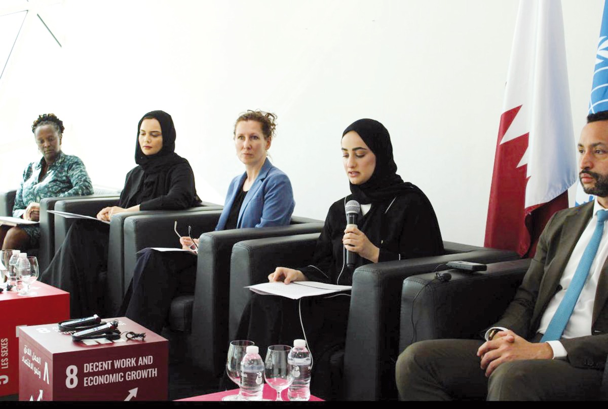 Assistant Undersecretary for Migrant Labours Affairs at the Ministry of Labour H E Sheikha Najwa bint Abdulrahman Al Thani (second right) speaking at the event.