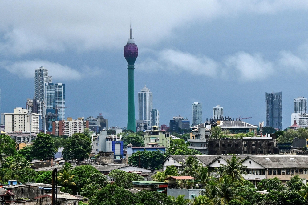 Clouds loom over the sky of Sri Lanka's capital Colombo on August 20, 2024. (Photo by Ishara S. KODIKARA / AFP)

