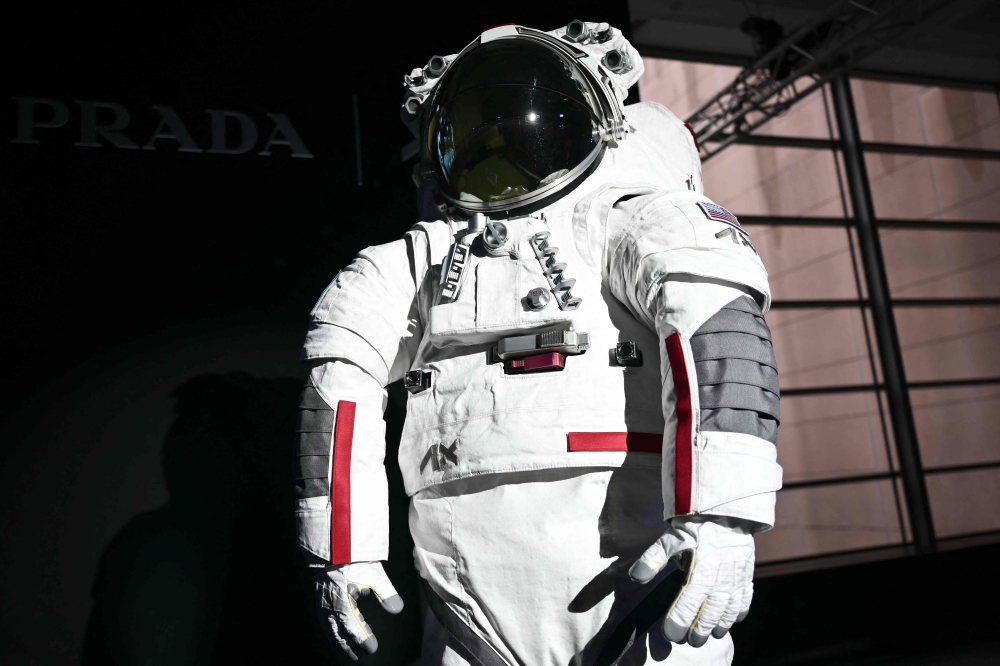 The AxEMU suit is pictured during a press conference of Prada and Axiom Space, as part of the presentation of the Axiom Extravehicular Mobility Unit designed and developed for the Artemis 3 lunar mission in collaboration with Prada, at the MiCo Convention Centre in Milan, northern Italy, on October 16, 2024. Photo by MARCO BERTORELLO / AFP