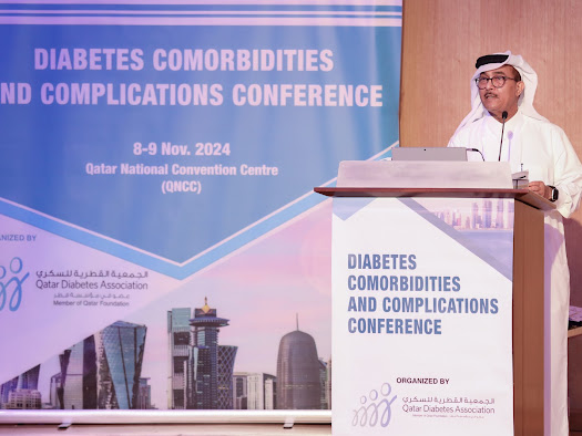 Dr. Abdullah Al Hamaq giving a speech at the event.