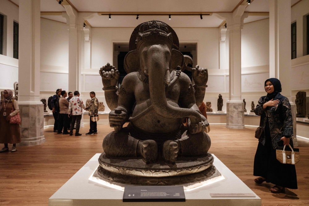 In this photo taken on October 11, 2024, the statue of Ganesha is displayed during the reopening ceremony ahead of the public opening at the National Museum of Indonesia in Jakarta. (Photo by Yasuyoshi Chiba / AFP) 