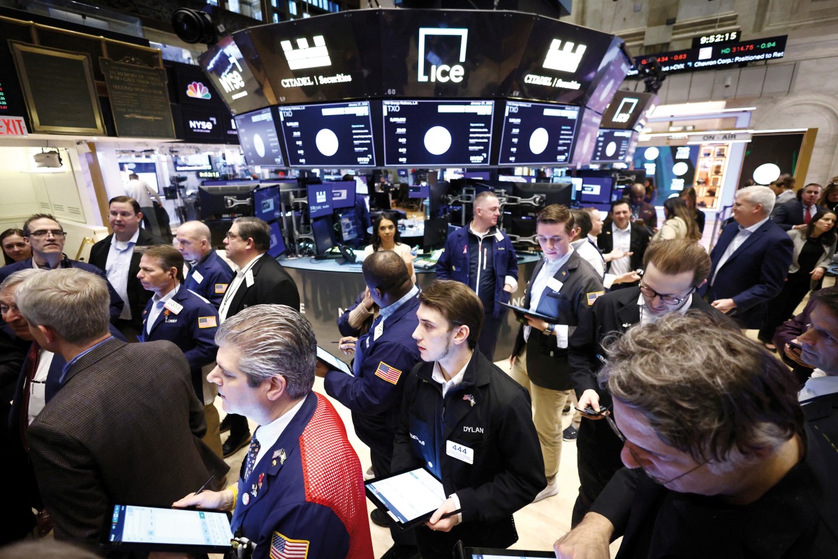 A file photo of traders working on the trading floor at the New York Stock Exchange (NYSE) in New York City, US.