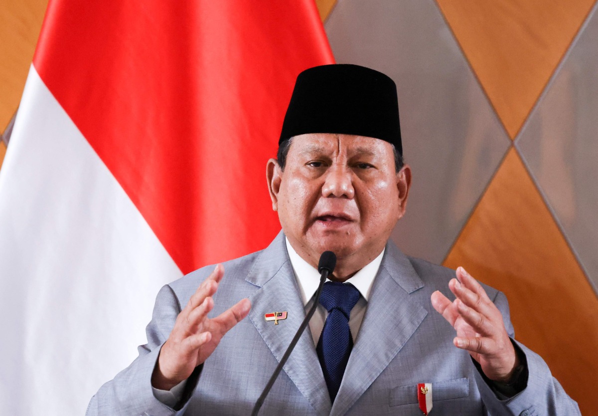 (FILES) Indonesia's President Prabowo Subianto speaks as he attends a press conference with Malaysian Prime Minister Anwar Ibrahim (not pictured) during a meeting in Kuala Lumpuron January 27, 2025. (Photo by HASNOOR HUSSAIN / POOL / AFP)
