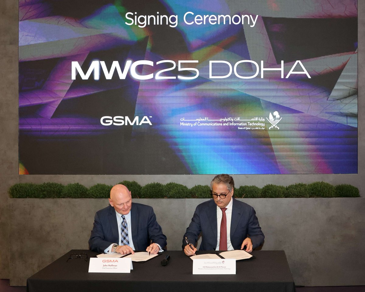 Minister of Communications and Information Technology H E Mohammed bin Ali Al Mannai and CEO of Global System for Mobile Communications Association John Hoffman signing the agreement