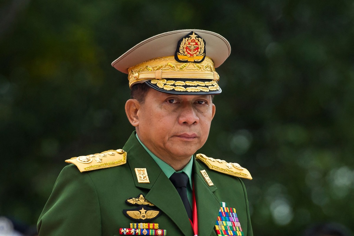 (FILES) Myanmar's Chief Senior General Min Aung Hlaing, commander-in-chief of the Myanmar armed forces, looks on during the 71th anniversary of Martyrs' Day in Yangon on July 19, 2018. (Photo by AFP)
