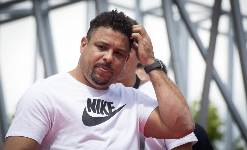 (FILES) In this file photo taken on June 12, 2018 former Brazilian international player Ronaldo gestures during a promotional event in Moscow, ahead of the Russia 2018 World Cup football tournament. AFP / Mladen ANTONOV