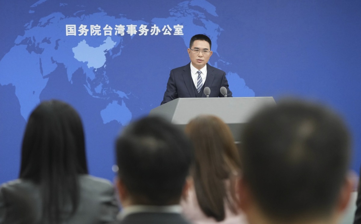 Chen Binhua, spokesperson for the Taiwan Affairs Office of the State Council, answers questions at a regular press conference in Beijing, capital of China, March 12, 2025. (Xinhua/Chen Yehua)
