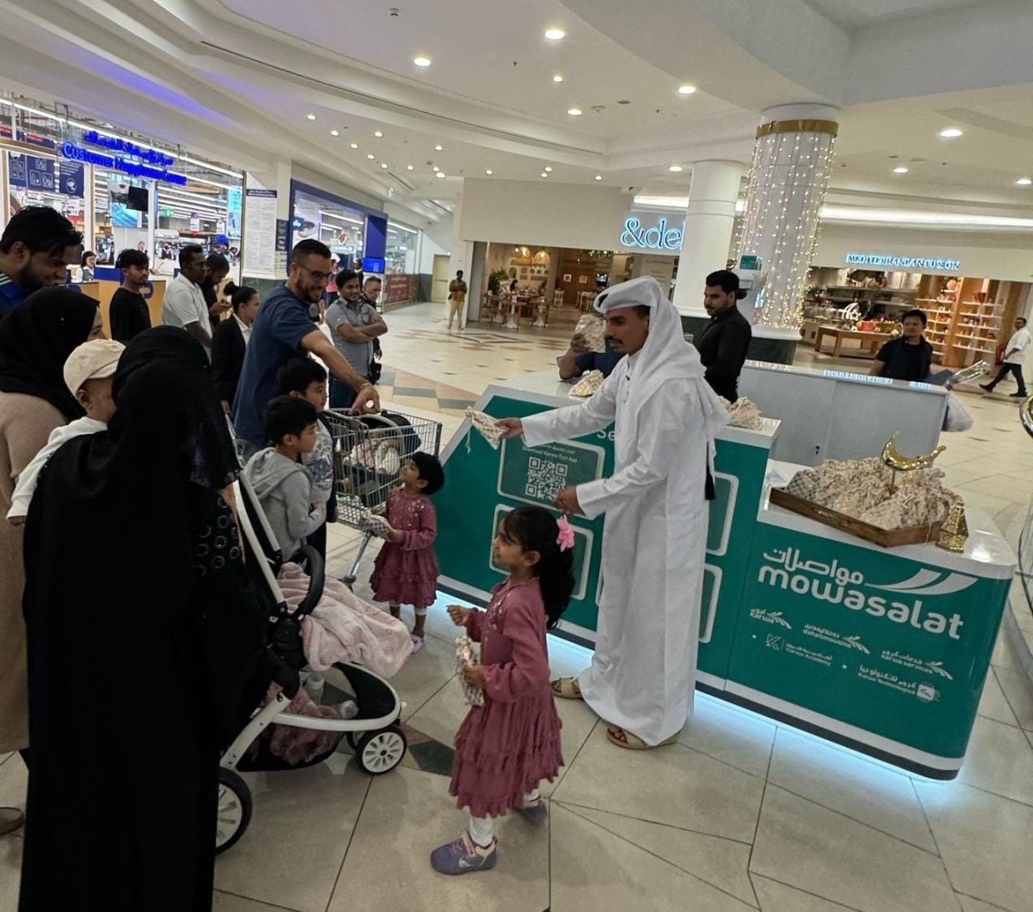 Families throng a booth set up by Mowasalat as part of Garangao celebrations.  