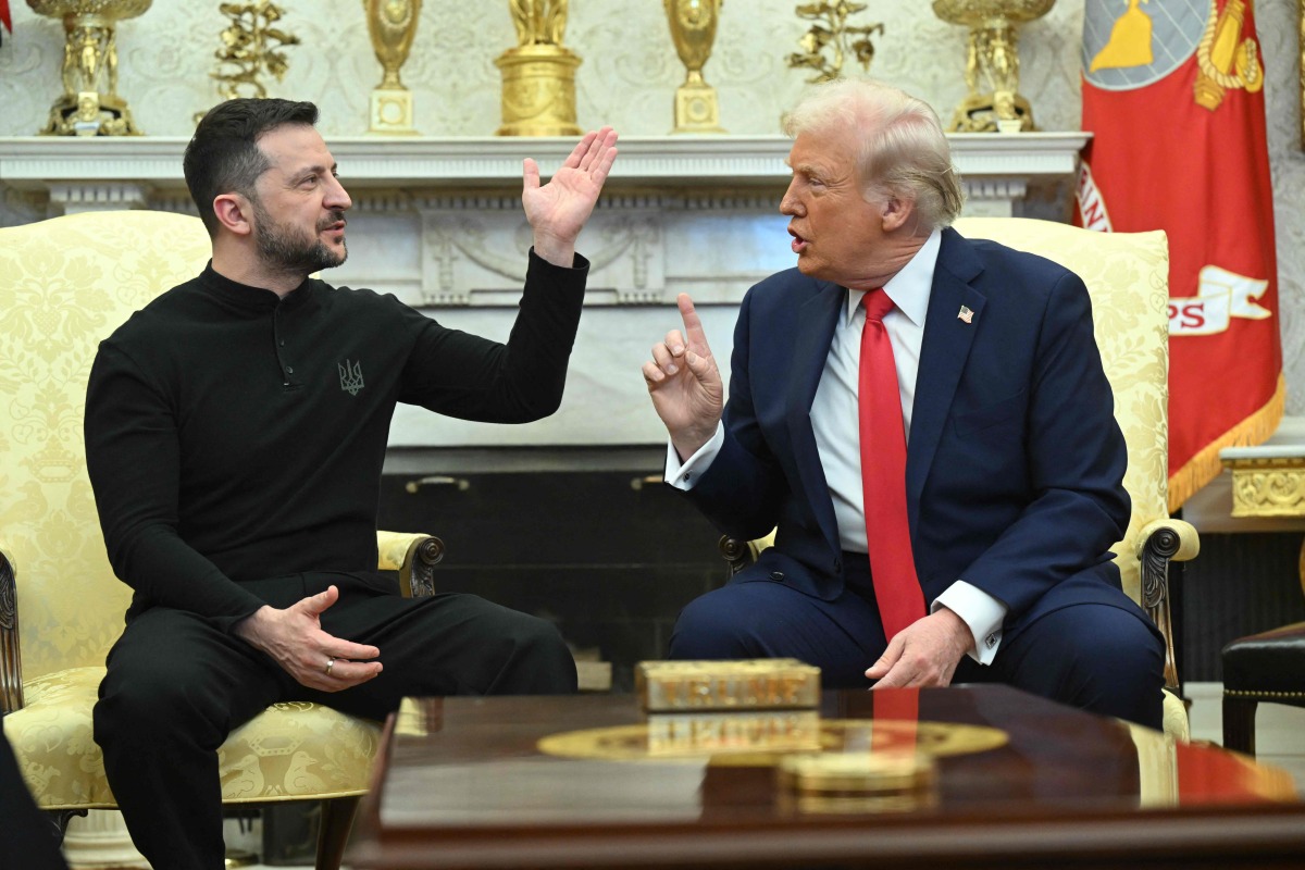 US President Donald Trump and Ukraine's President Volodymyr Zelensky meet in the Oval Office of the White House in Washington, DC, February 28, 2025. (Photo by Saul Loeb / AFP)

