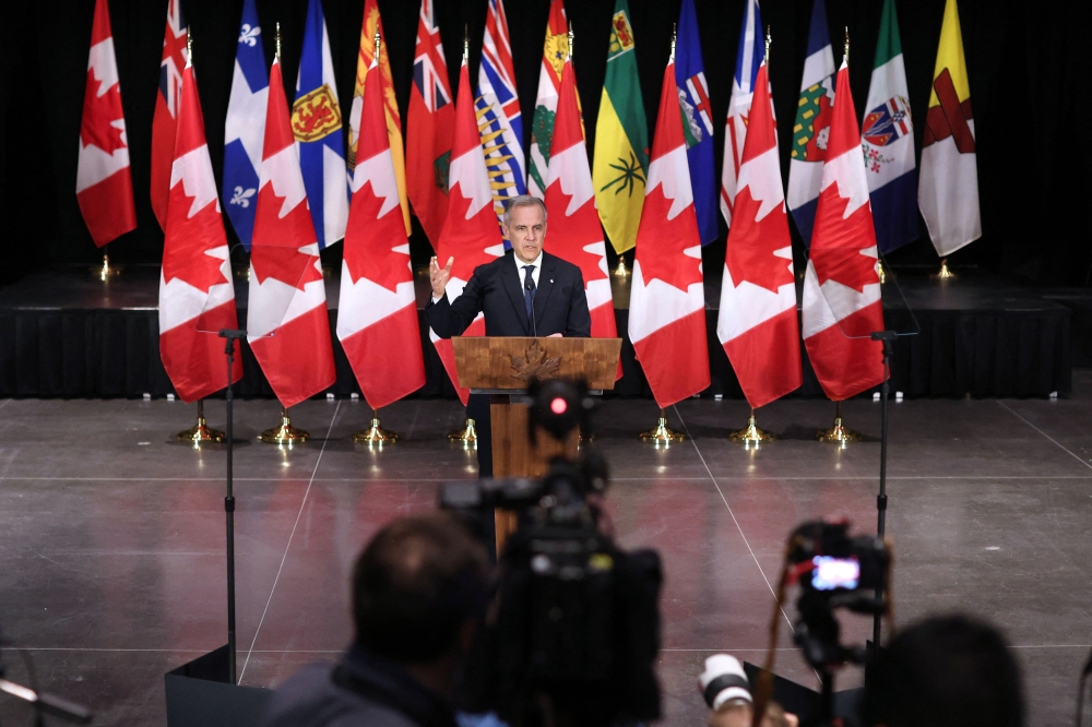 Canada's Prime Minister Mark Carney speaks during a press conference after the First Ministers Meeting in Ottawa, Canada on March 21, 2025. (Photo by Dave Chan / AFP)
