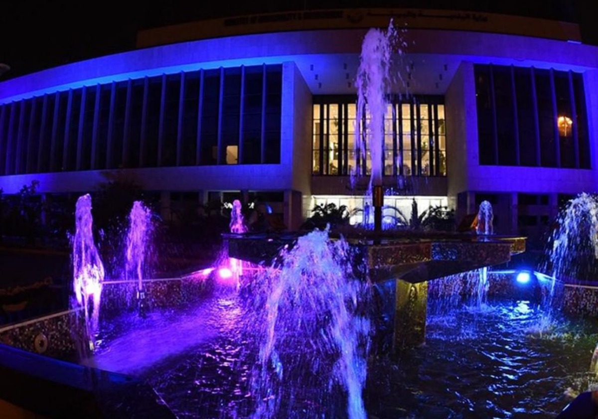 The headquarters of the Ministry of Municipality illuminates in blue at Corniche.