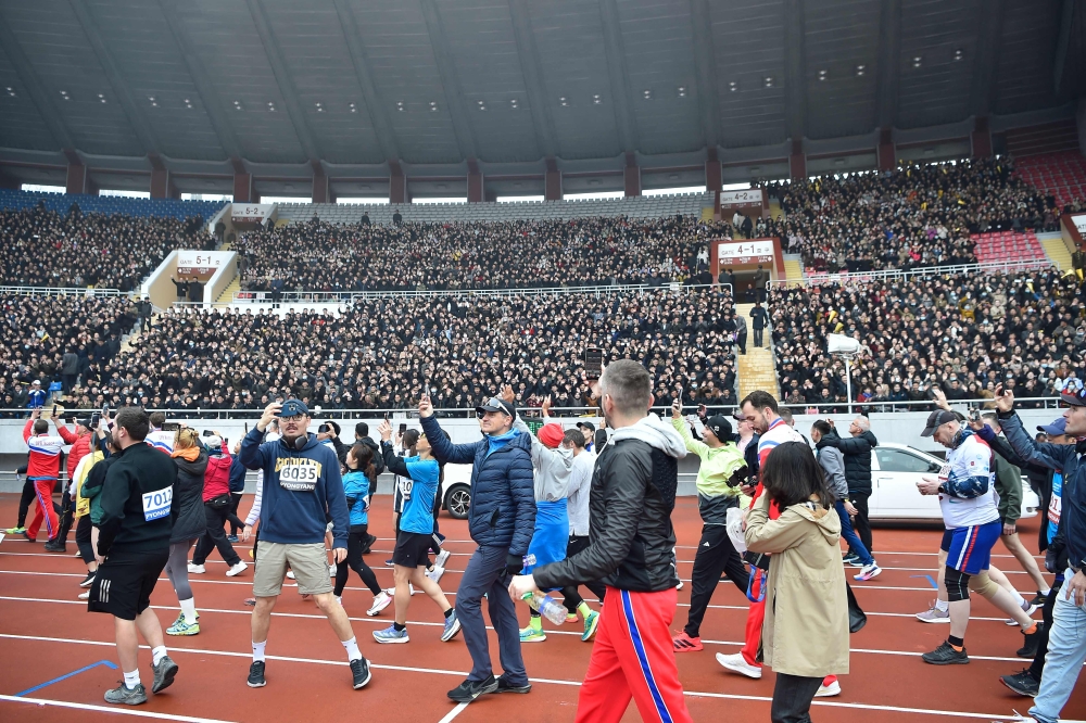 Participants attend the 31st Pyongyang International Marathon at Kim Il Sung Stadium in Pyongyang on April 6, 2025. (Photo by Kim Won Jin / AFP)