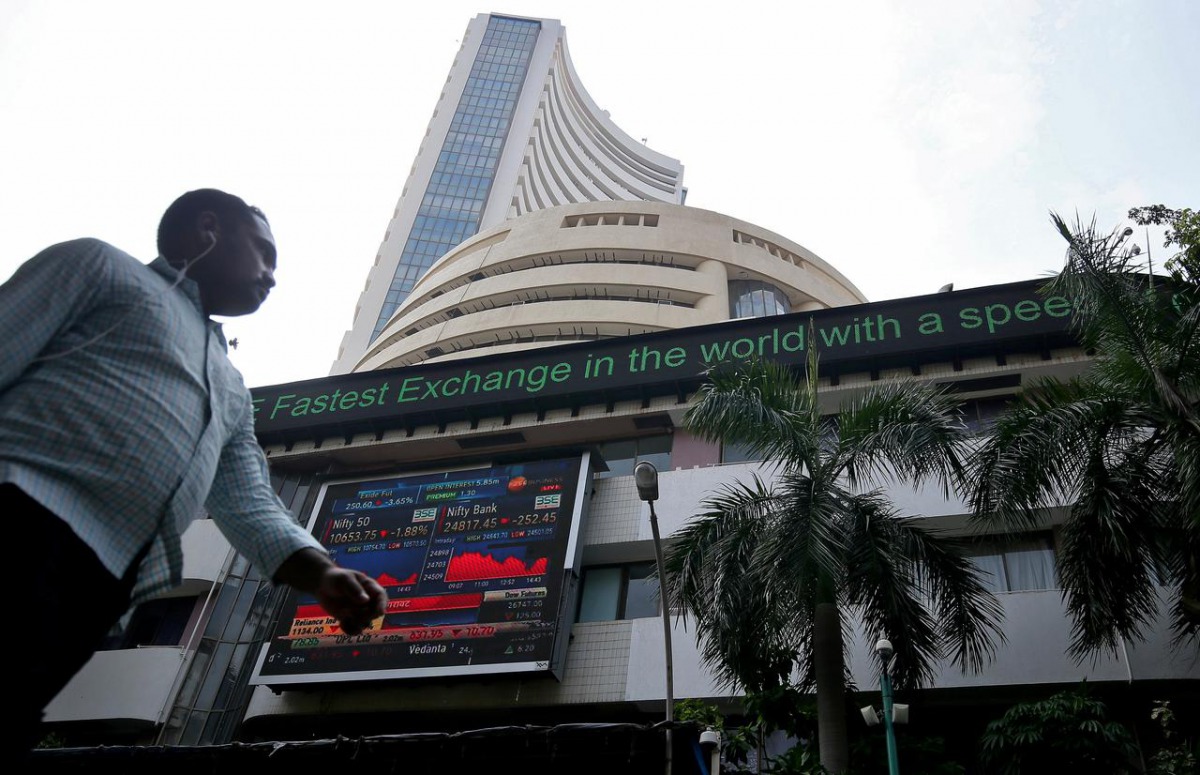 FILE PHOTO: A man walks past the Bombay Stock Exchange (BSE) building in Mumbai, India October 4, 2018. REUTERS/Francis Mascarenhas