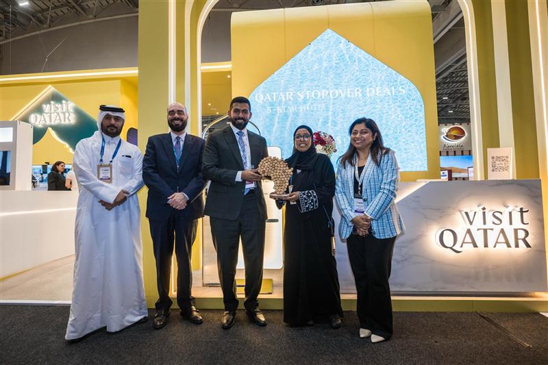 Officials and partners at the Visit Qatar pavilion at WTM Africa. 