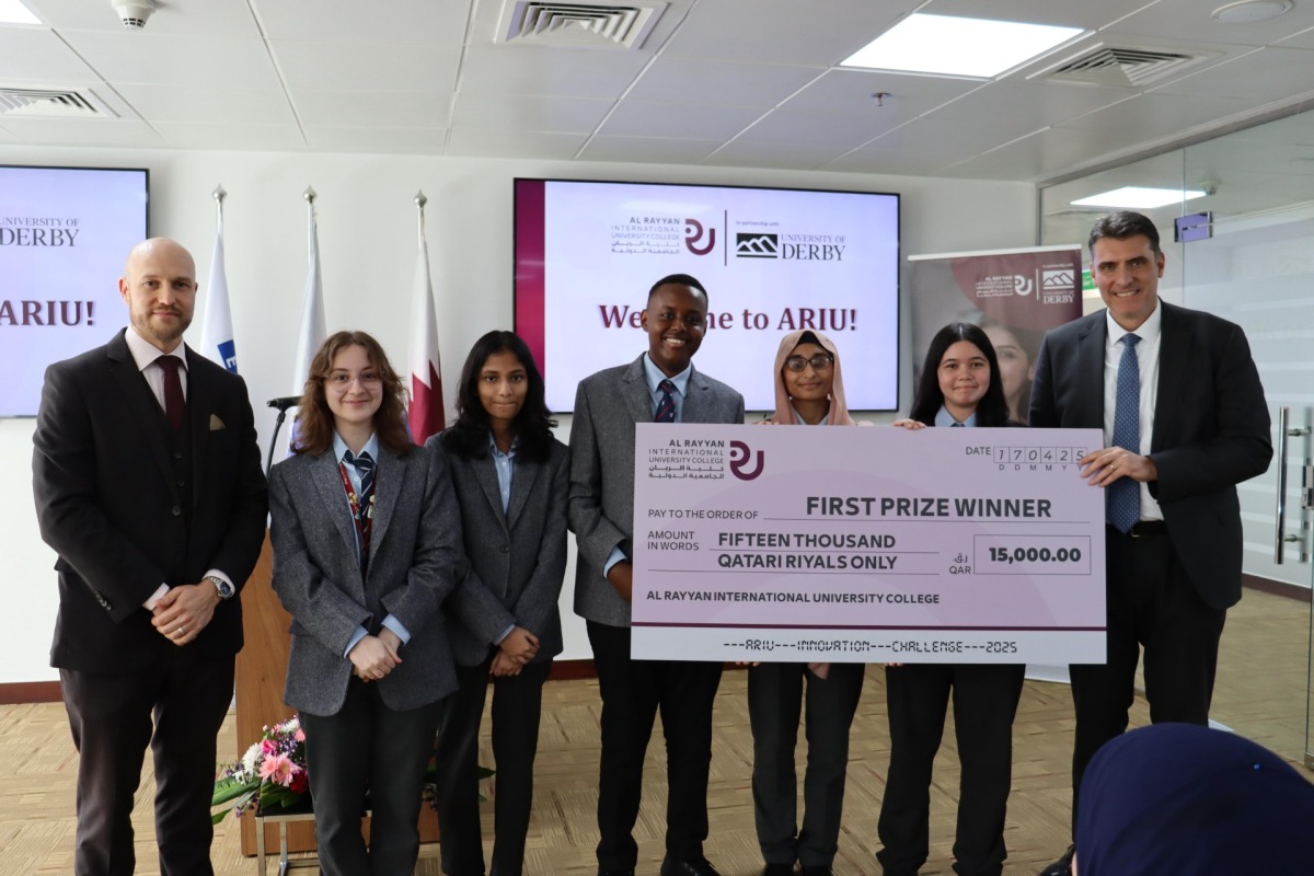 The first prize winning team with their cheque.