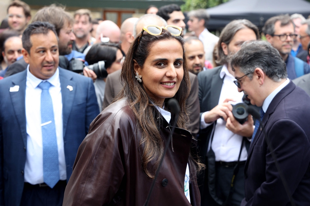 Qatar's Sheikha Al Mayassa bint Hamad bin Khalifa Al-Thani attends a ceremony marking Qatar's first official participation in the Venice Architecture Biennale on May 8, 2025. (Photo by Patrick Baz / Qatar Pavillon / AFP)