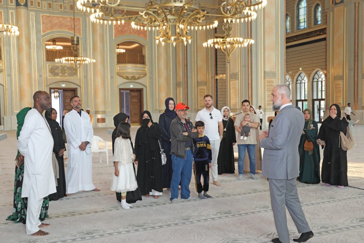 Visitors are briefed during a tour to Sheikh Hamad bin Jassim bin Jaber Al Thani Mosque. 
