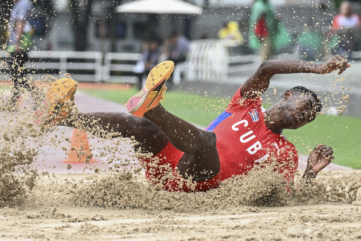 Abraham Viltre from Cuba competes in the Long Jump T46/47 during the Grand Prix Para Cali at the Pedro Grajales Stadium in Cali, Colombia May 17, 2025. (Photo by JOAQUIN SARMIENTO / AFP)