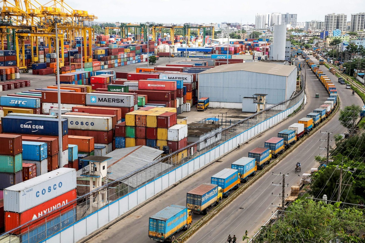 Container cranes lie non-operational at the Chittagong Port in Chittagong on June 29, 2025, as export and import activities remained suspended due to an ongoing protest by employees of the National Board of Revenue (NBR) over reform issues by Bangladesh's interim government. (Photo by AFP)