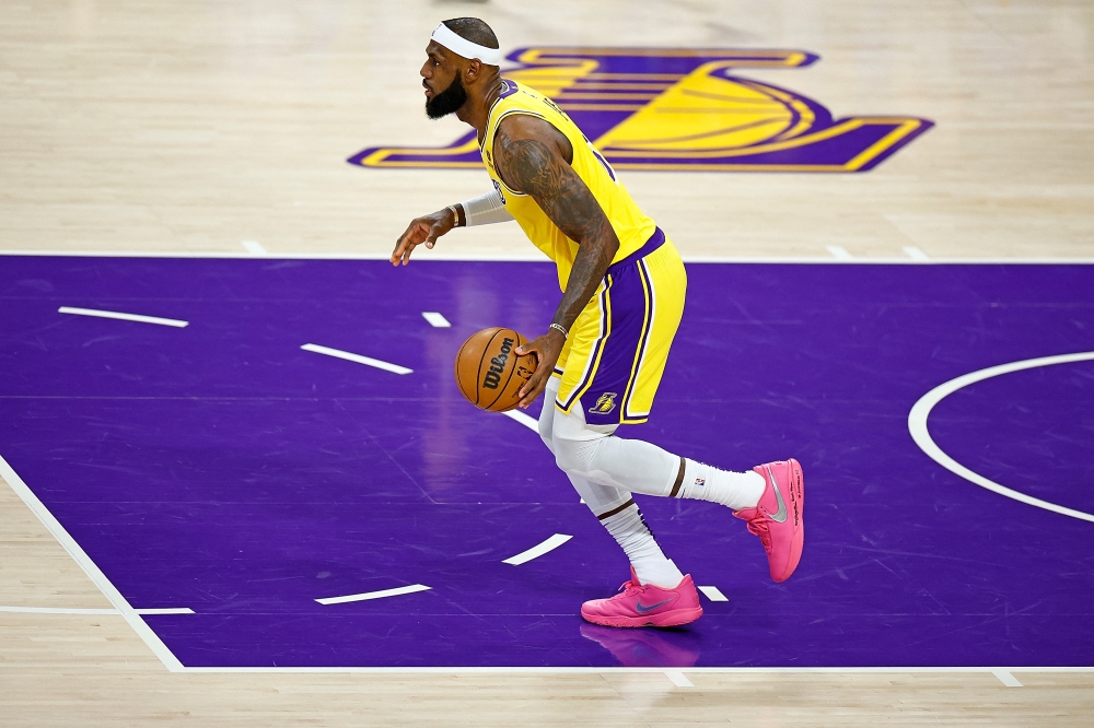 File: LeBron James of the Los Angeles Lakers handles the ball during the first half of a game against the Oklahoma City Thunder at Crypto.com Arena on February 07, 2023 in Los Angeles, California. (Photo by Ronald Martinez/Getty Images via AFP)