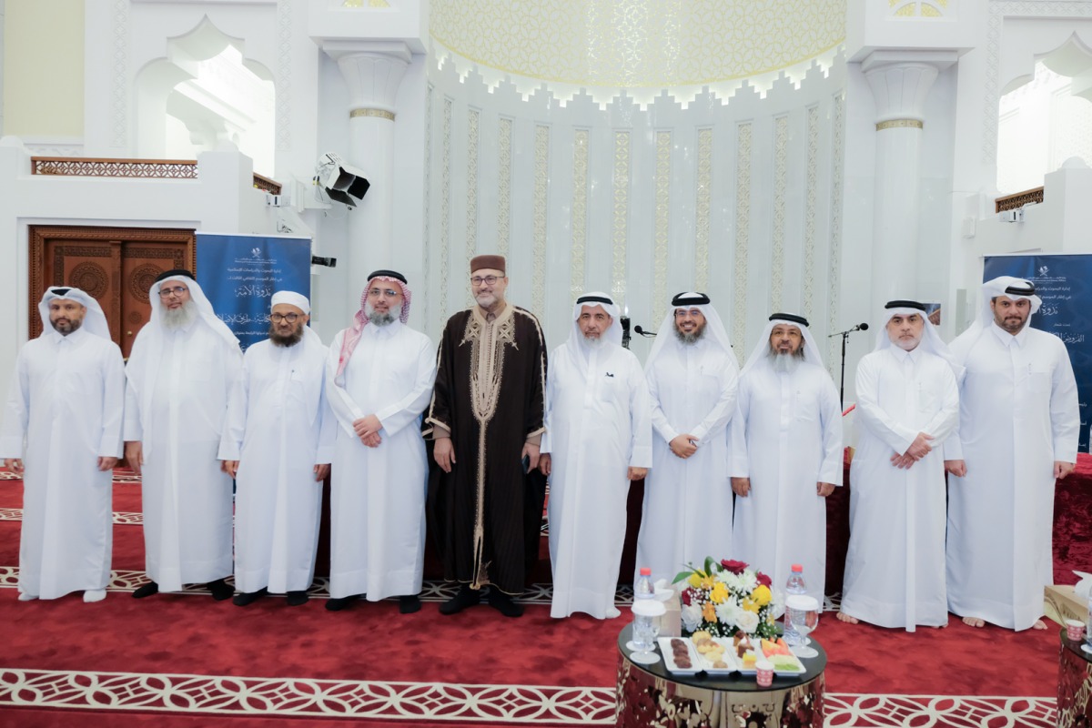 Minister of Awqaf and Islamic Affairs H E Ghanem bin Shaheen bin Ghanem Al Ghanim (fifth right) with other officials during the event.