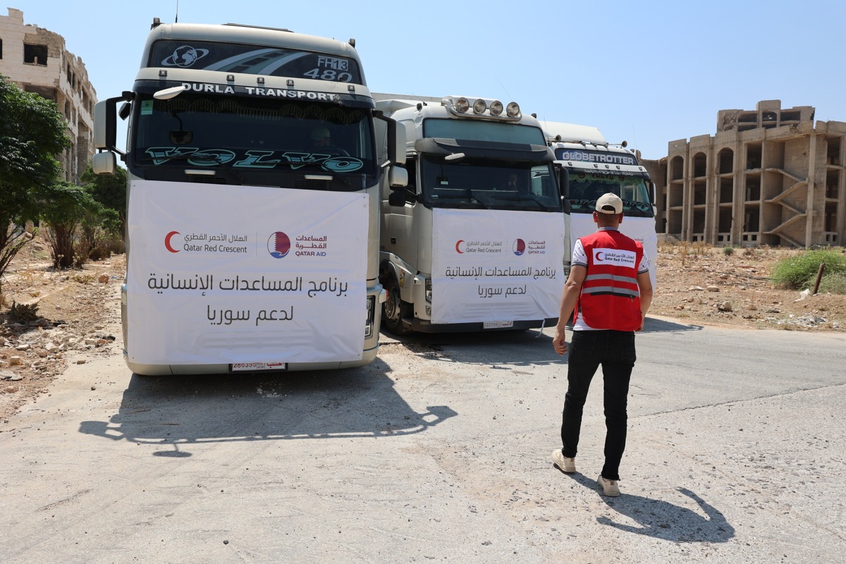 A QRCS official with some of the food aid.