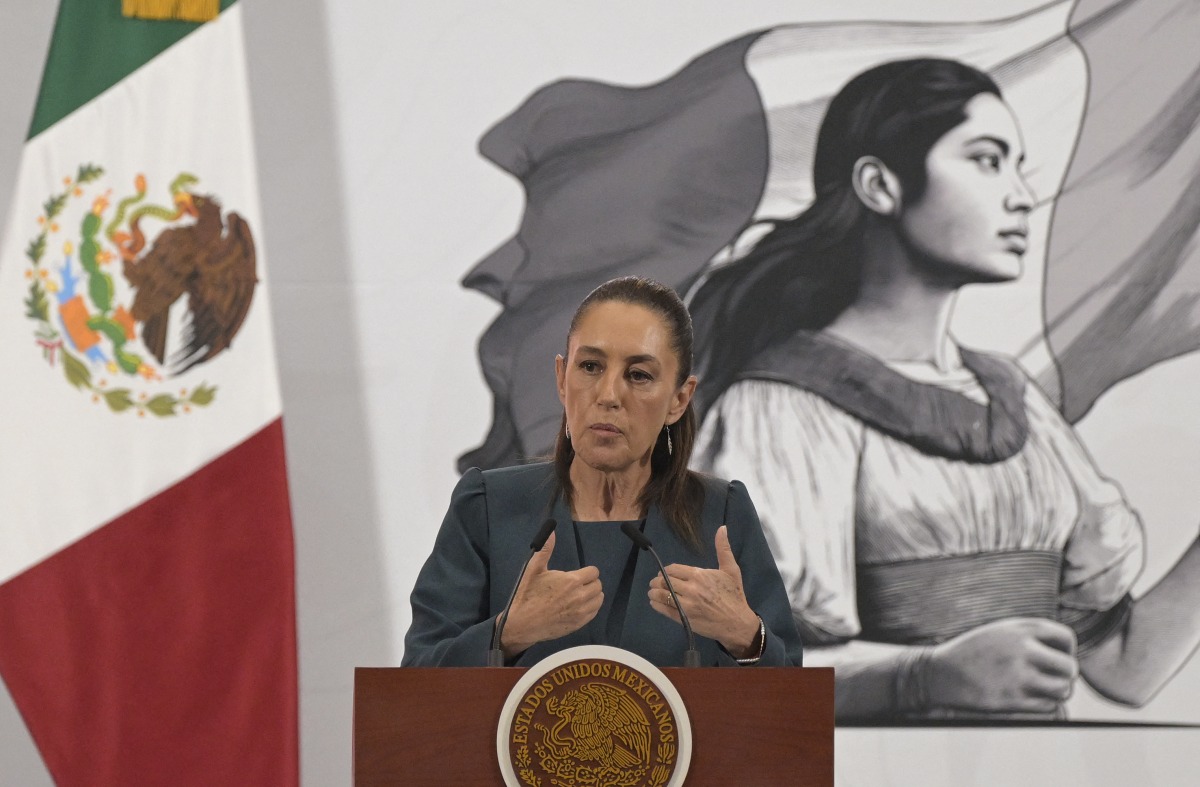 Mexico's President Claudia Sheinbaum speaks during her 'Mananera' daily press conference at Palacio Nacional in Mexico City on May 19, 2025. (Photo by Alfredo ESTRELLA / AFP)