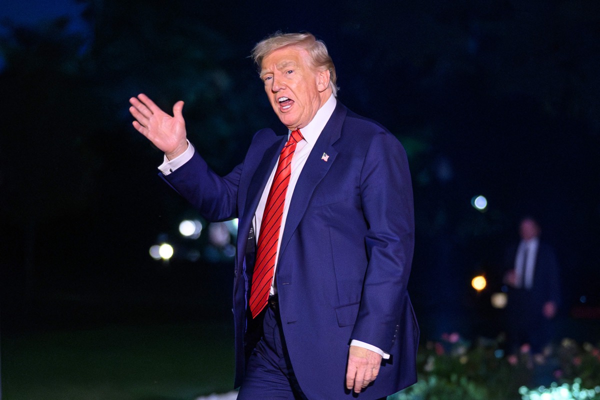 US President Donald Trump waves as he walks across the South Lawn upon return to the White House in Washington, DC on August 3, 2025 after spending the weekend at his Bedminster residence. (Photo by Mandel NGAN / AFP)