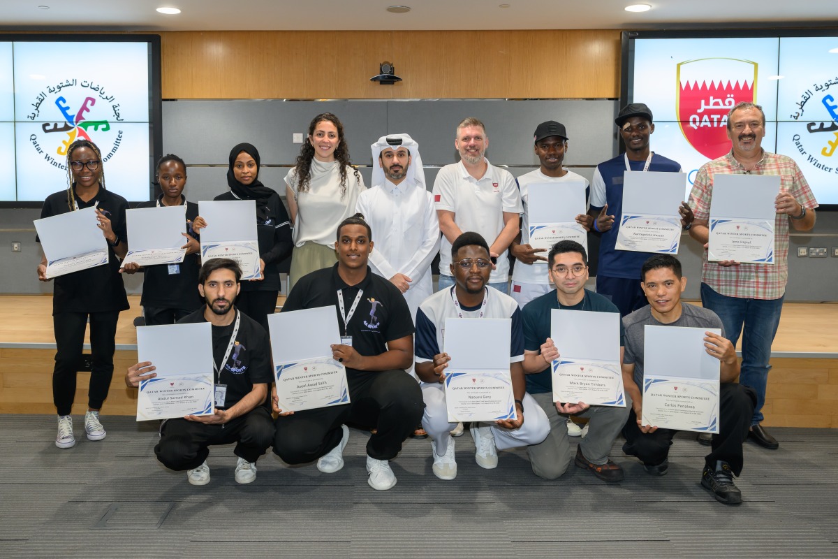 QWSC officials and staff in a group photograph after the completion of the course.