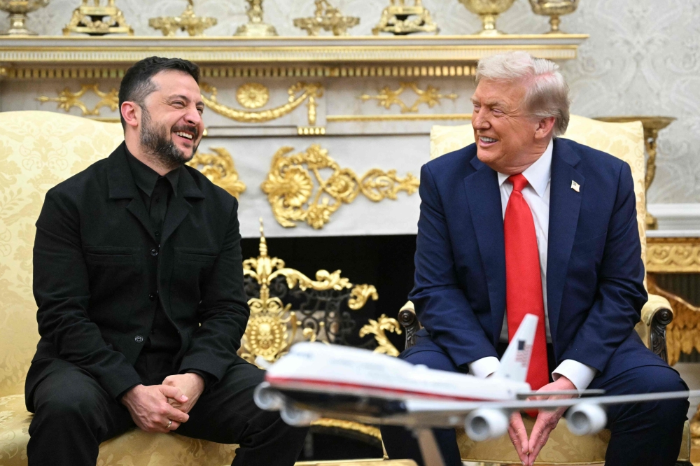 Ukrainian President Volodymyr Zelensky and US President Donald Trump during a meeting in the Oval Office of the White House in Washington, DC, on August 18, 2025. (Photo by Mandel Ngan / AFP)