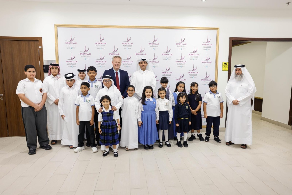 Officials with children during the opening ceremony.