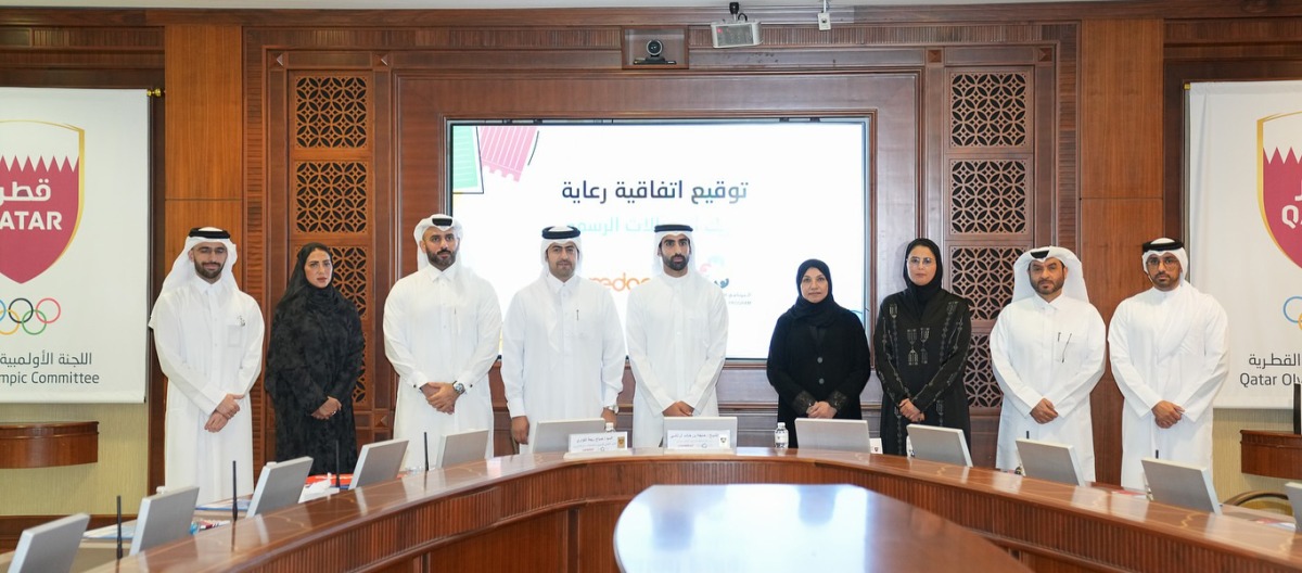 SOP Organizing Committee Chairman Sheikh Khalifa bin Khalid Al Thani poses for a photo with officials.