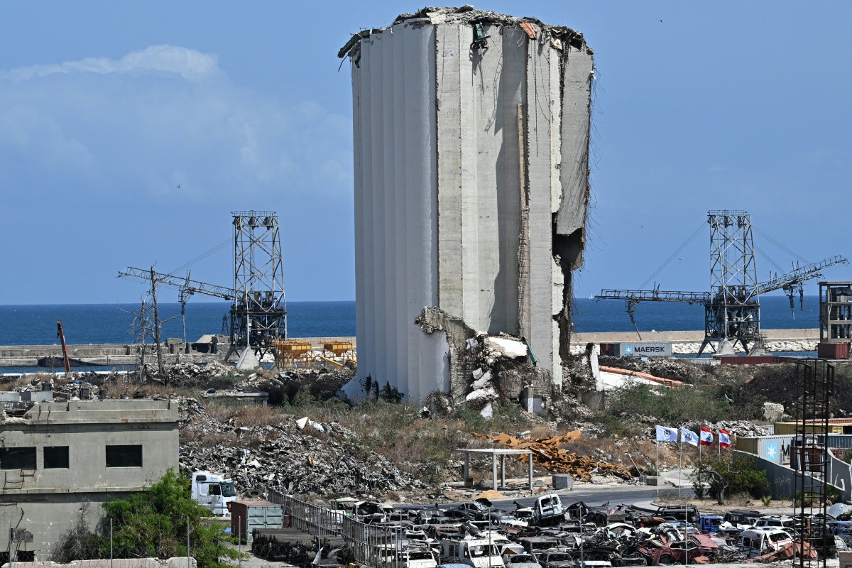 A picture shows a view of the destroyed Beirut port silos on August 1, 2025, as Lebanon prepares to mark the 5th anniversary of the August 4 harbour explosion that killed more than 250 people and injured thousands. (Photo by Joseph EID / AFP)

