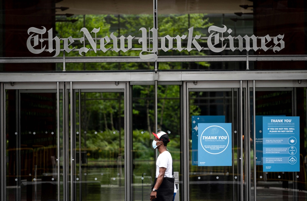 The New York Times building is seen on June 30, 2020 in New York City. (Photo by Johannes EISELE / AFP)