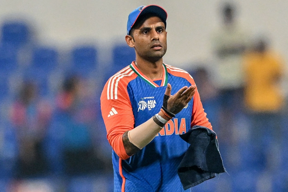 India's captain Suryakumar Yadav gestures at the end of the Asia Cup 2025 Twenty20 international cricket match between India and Oman on September 19, 2025. (Photo by Sajjad Hussain / AFP)