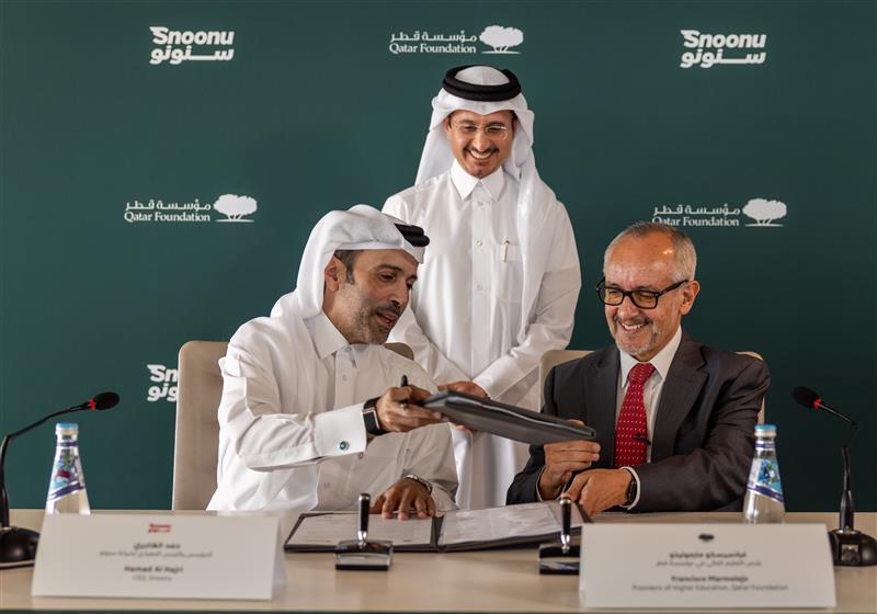 Founder and CEO of Snoonu, Hamad Mubarak Al-Hajri and President of Higher Education and Education Advisor, Qatar Foundation, Francisco Marmolejo at the signing  event. 